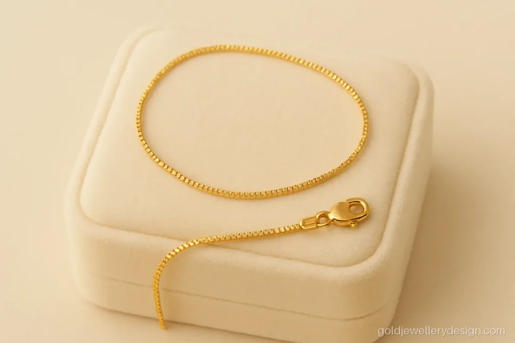 Plain baby gold chain design in strong box chain with a lobster clasp