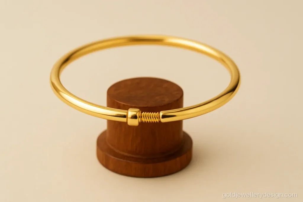 Baby boy gold kada design, a smooth plain kada with a screw opening