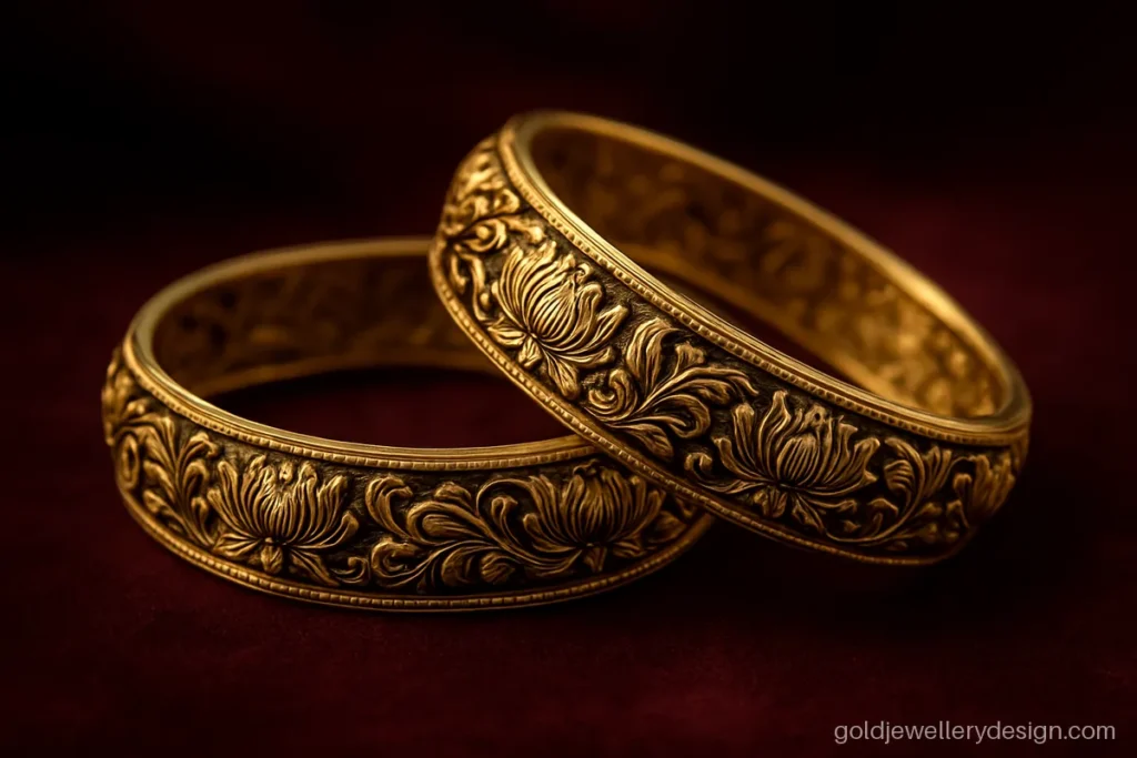 Antique gold bangles design with deep carved lotus flowers