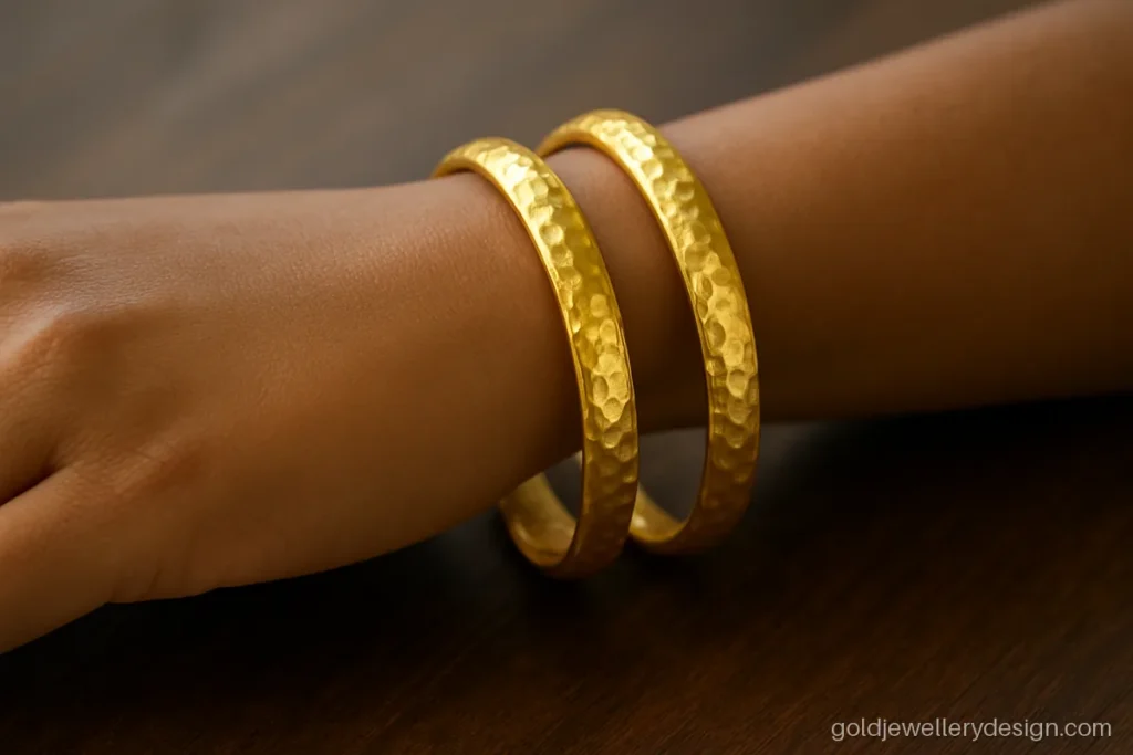 Stylish simple gold bangles with a hand-hammered texture