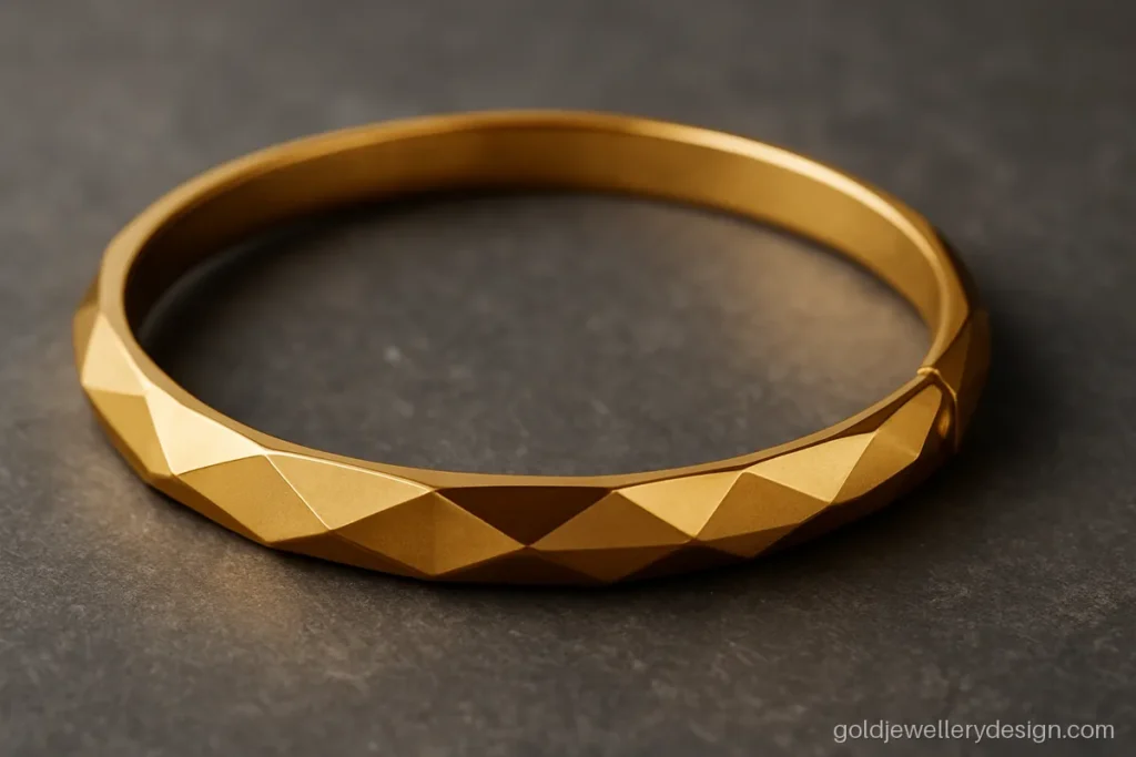 Stylish new model gold bangles design with geometric facets on an oval shape