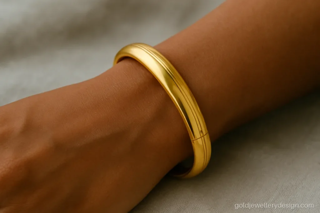 Simple daily wear bangle gold design with a screw opening for easy wear