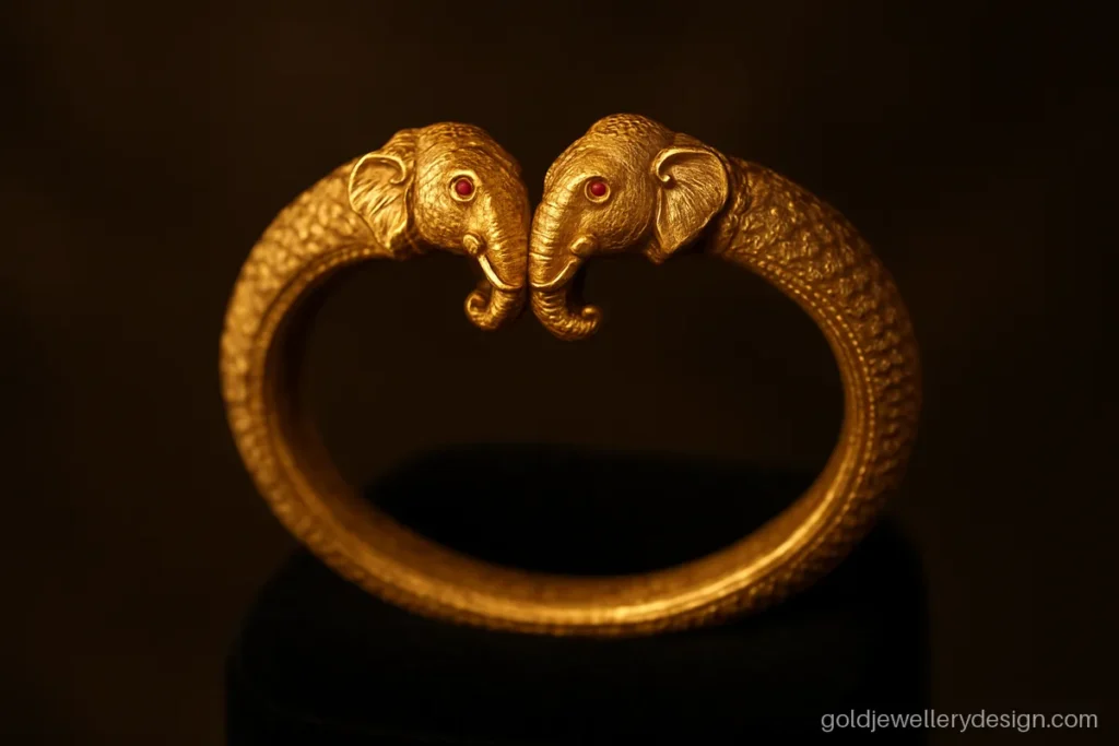 Traditional bangle gold design with two elephant heads meeting at the front