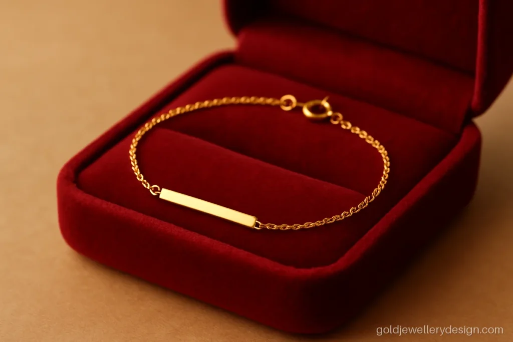 Light daily bracelet gold design with one plain bar on a fine chain