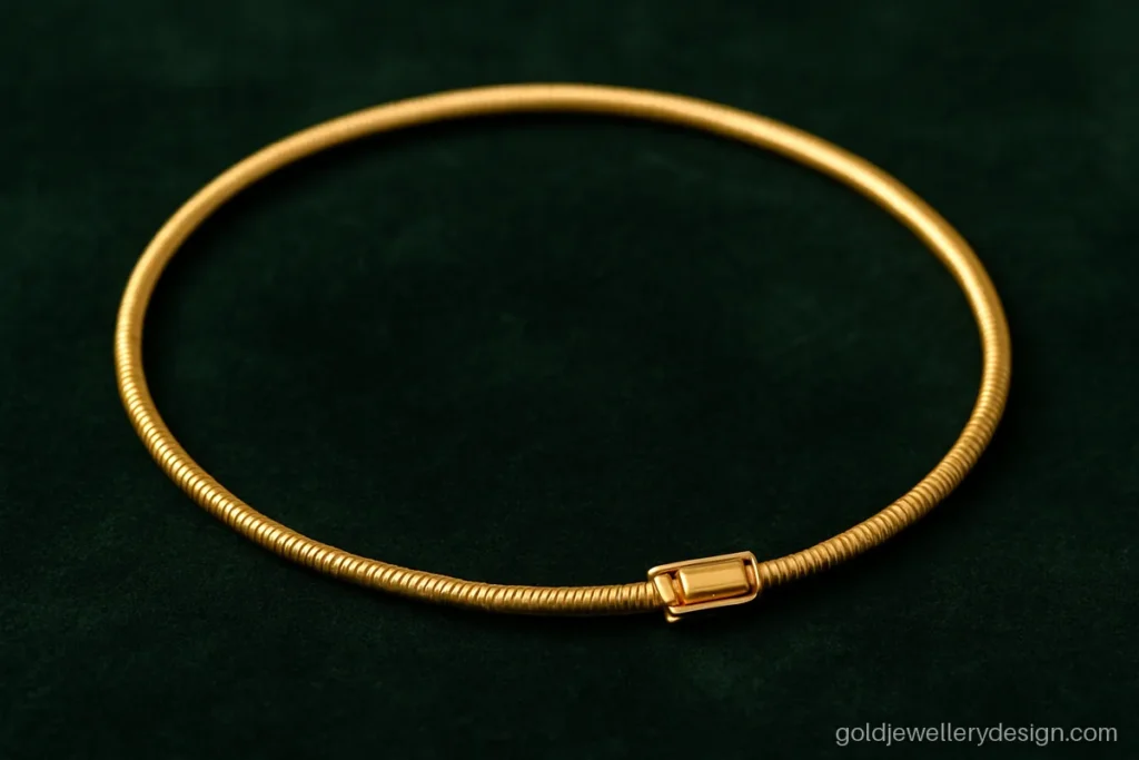 Women gold bracelet design in a thin snake chain for daily wear