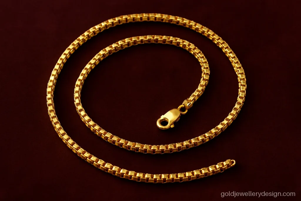 Ladies gold chain design in two long box link layers of 24 and 28 inches