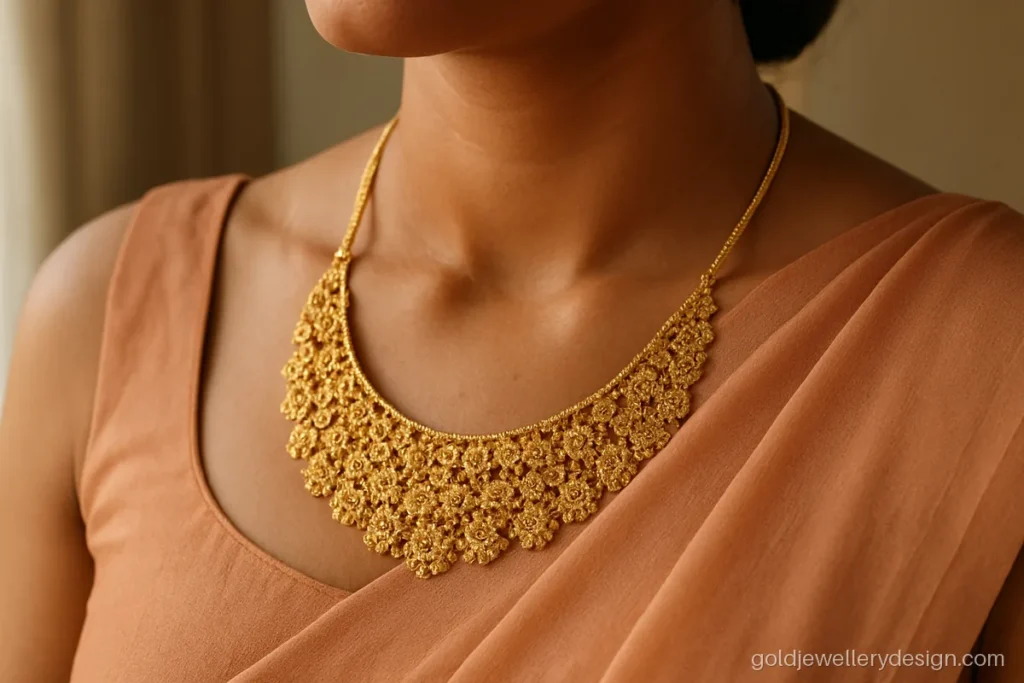 Haar design gold with a floral net front worn with a georgette saree