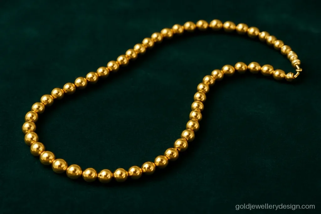 Matar mala gold design with round pea shaped gold beads in a long strand