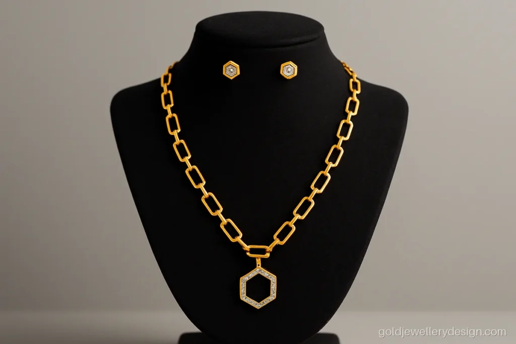 New gold haar design with geometric links and CZ accents on a jewellery bust