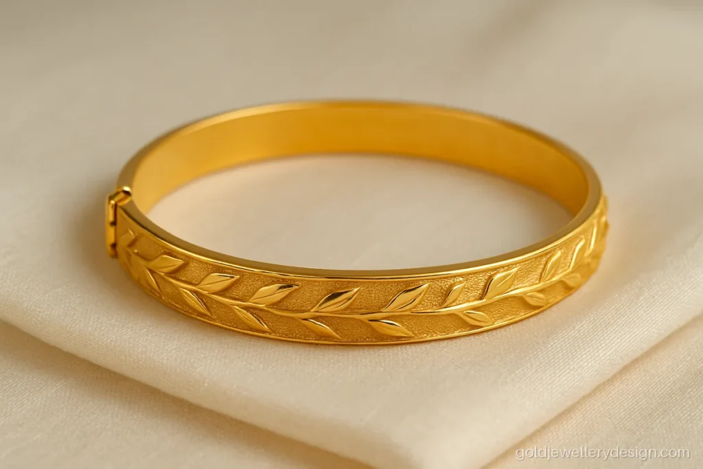 Gold kade design with leaf vine engraving for single hand wear