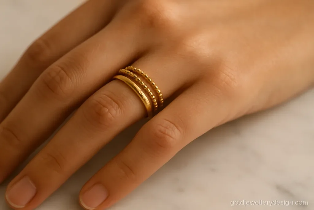 Latest gold ring design for female, a stack of three thin mixed finish bands