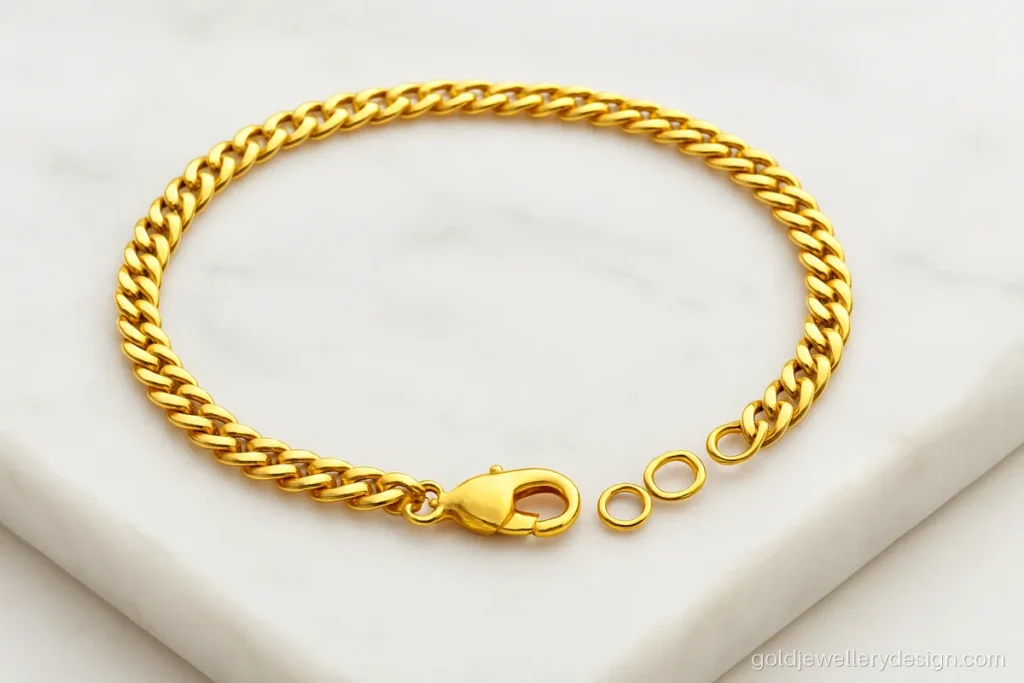 Boys gold bracelet design in a thin curb link with an adjustable clasp
