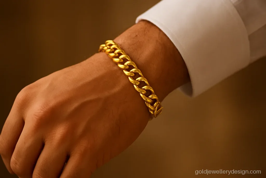 Mens bracelet gold design in a rounded cuban link worn on the wrist