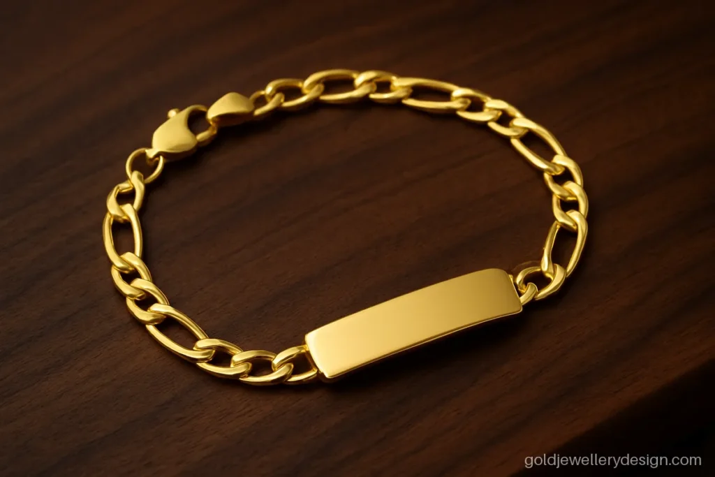 Gents bracelet design gold with a figaro link and a flat ID plate for a name