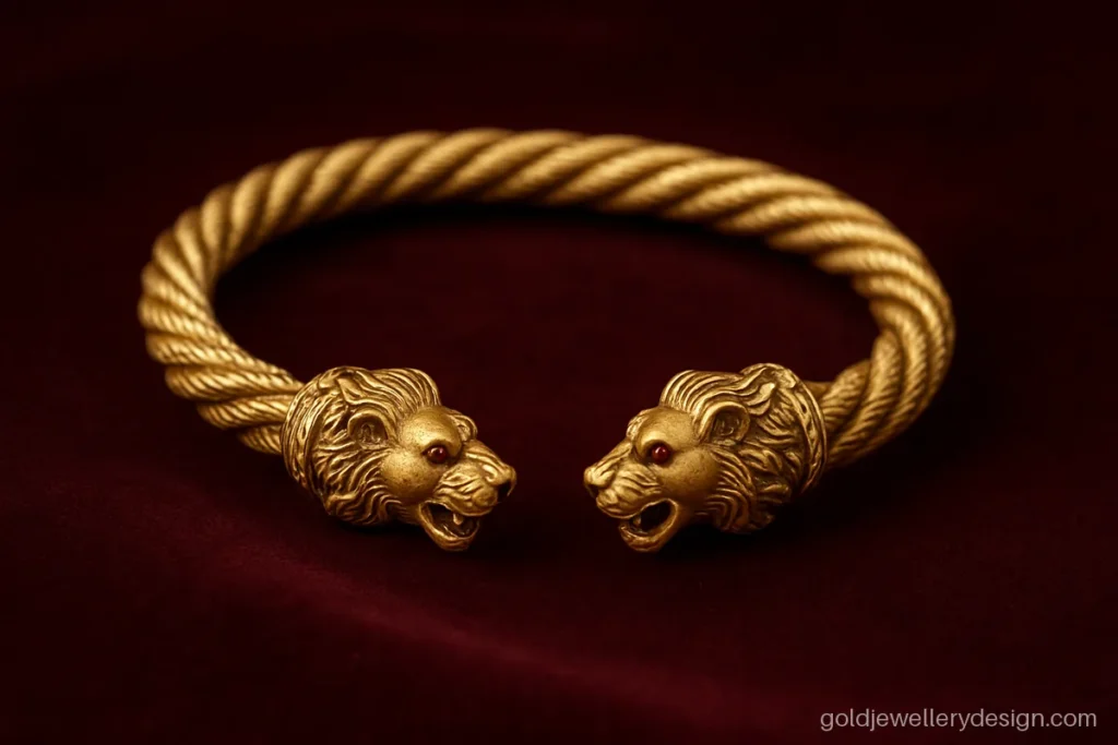Gold kada design for man with a twisted rope body and open lion head ends