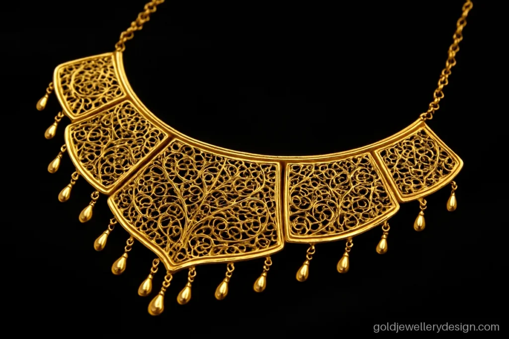 Arabic dubai gold necklace design with a filigree bib and high polish edges