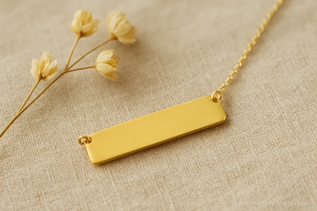 Horizontal blank gold bar plate pendant ready for a name to be engraved