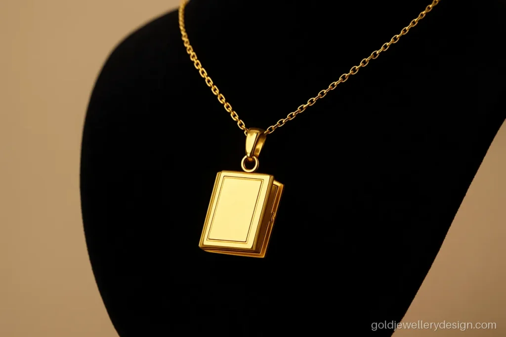 2 gram gold locket design in a slim rectangle book shape with polished edges