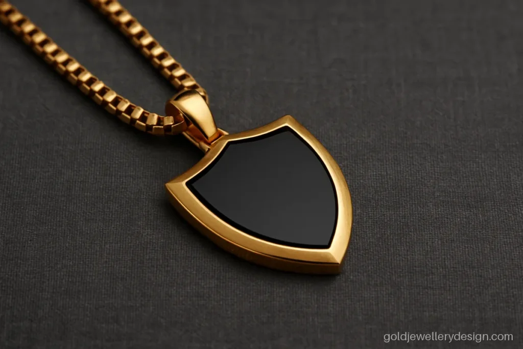 Shield shaped gold pendant for men with a black onyx inlay in the middle