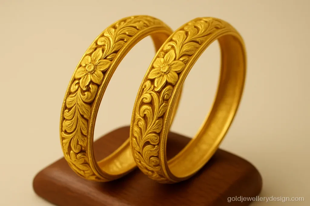 22k gold bangles design, a carved pair shown to explain weight and price