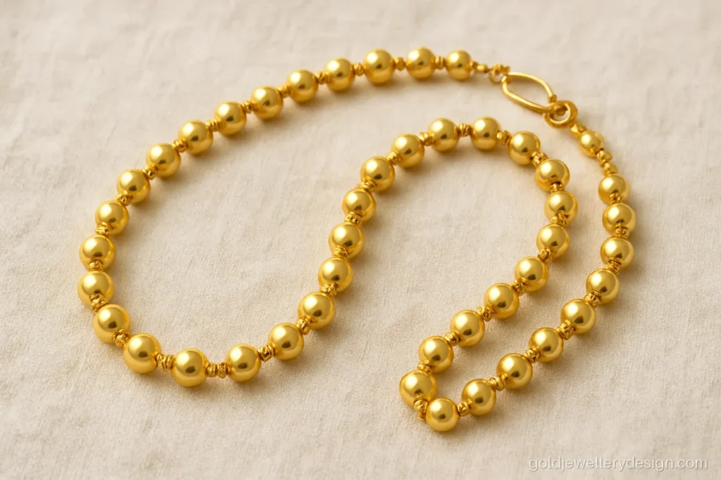 Gold moti design with price worked out from the weight of hollow gold beads
