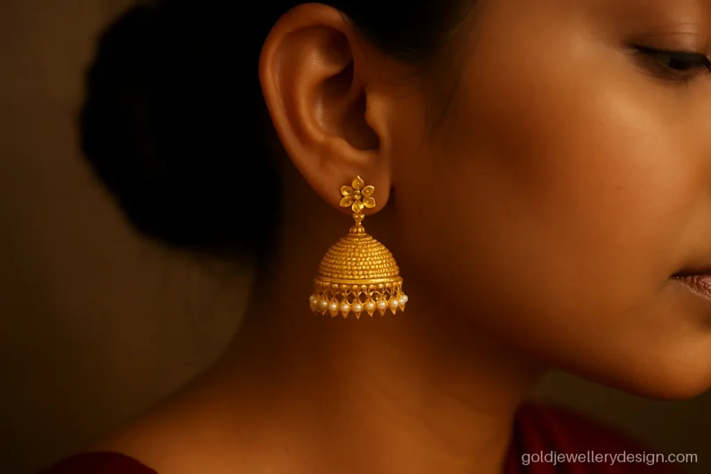 Gold jhumka design with price shown by gold weight and making charge