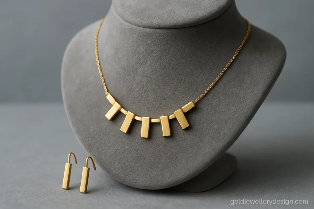 Stylish kitty set gold new design with geometric bars and matching drop earrings