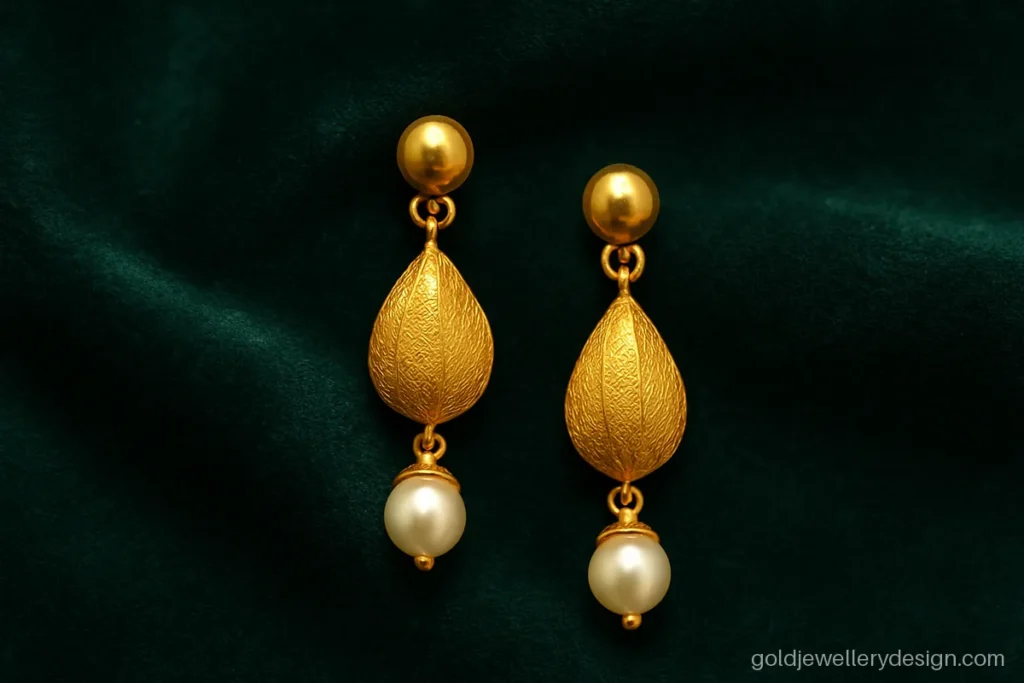 Latest gold latkan design with a mango kairi motif and a pearl tip