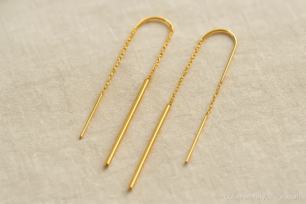 Simple gold sui dhaga design with a plain bar and a fine cable chain