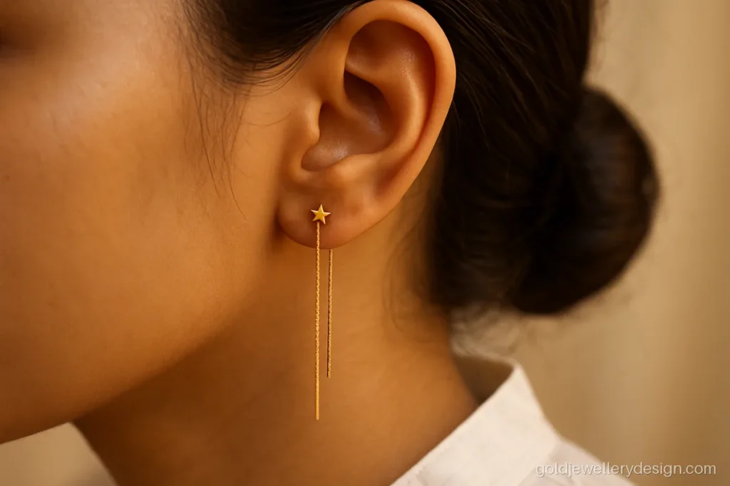 Sui dhaga earrings gold design with a tiny star on the front end
