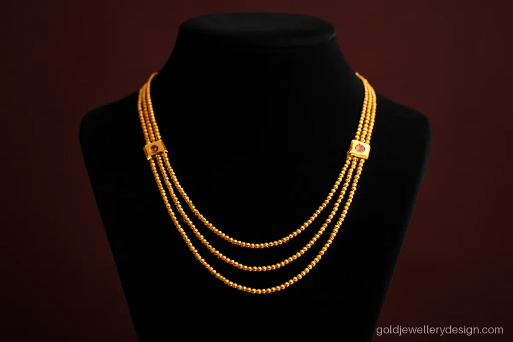 Gold haar design 20 gram in a three strand sitahar style on a bust