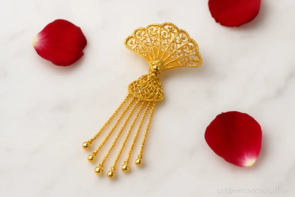 Light gold side tikka with filigree fan and thin chains